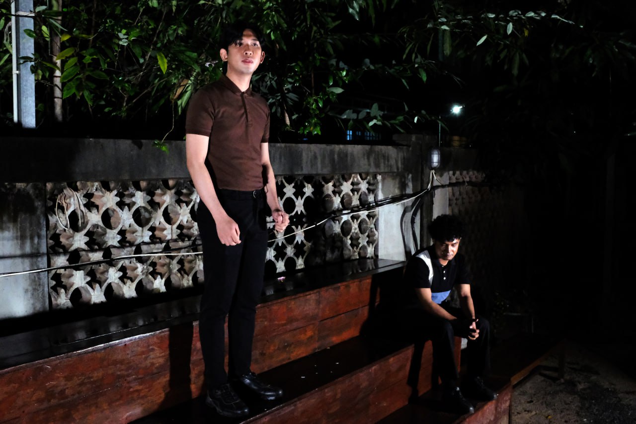 Two performers on steps